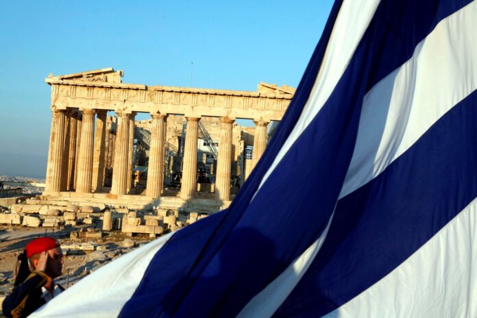 acropolis Στιγμιότυπο με την ελληνική σημαία και φόντο την Ακρόπολη